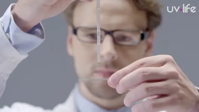 UV-Life video thumbnail: a scientist in a laboratory validating UV-C light efficacy
